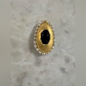 Vintage gold tone brooch.